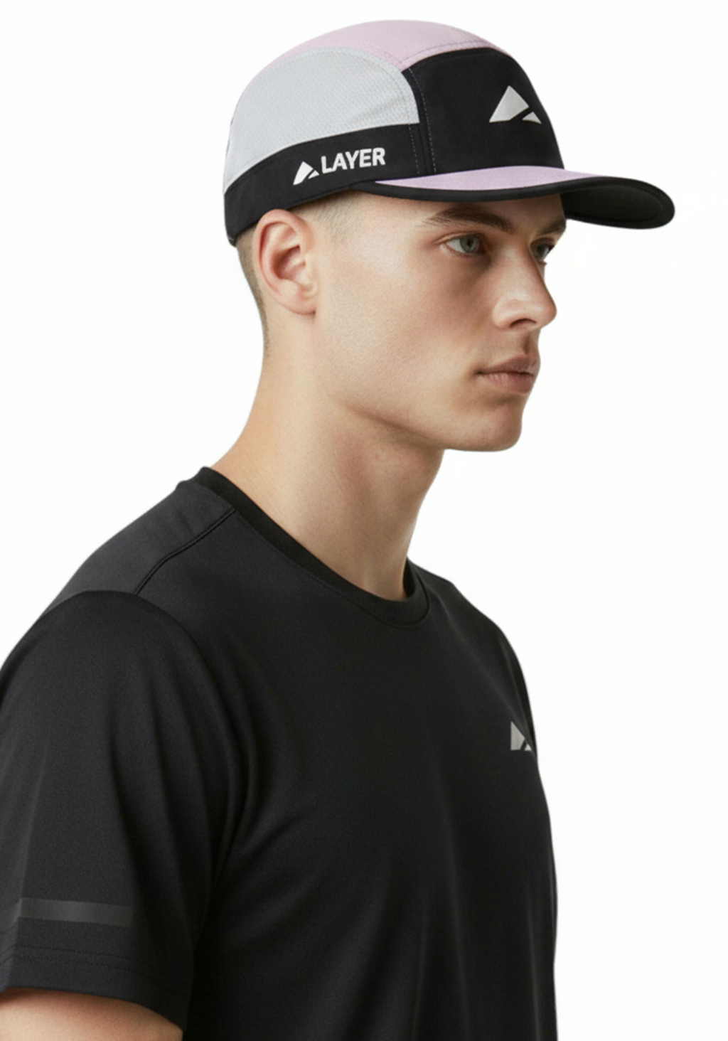 Runner wearing the Layer Running Cap in navy and lilac shown from the side during training