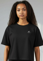 Layer Women’s FTR boxy graphic tee black close up front view showing chest logo