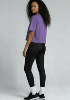Layer Women’s FTR boxy graphic tee purple rear three quarter view worn by female athlete
