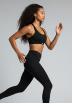 Layer Training Bra black in running motion, highlighting supportive fit and comfort