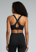 Back view of Layer Training Bra black with cross back straps and adjustable fit