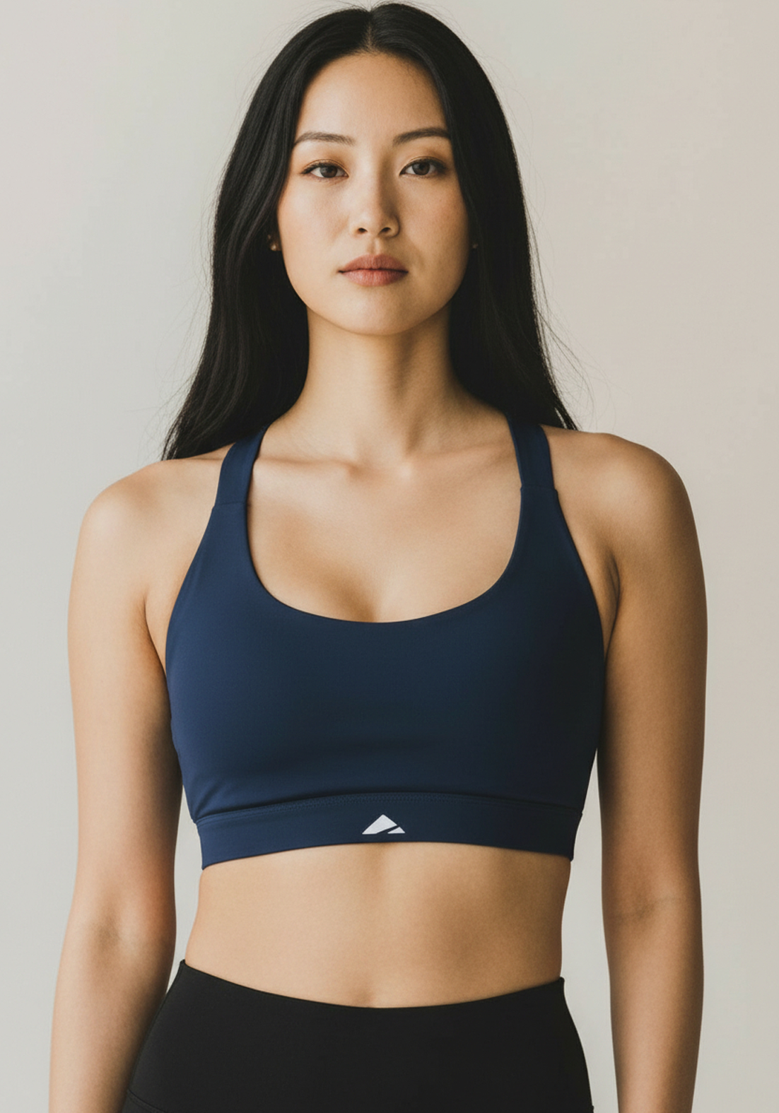 Layer Training Bra in navy with scoop neckline and subtle Layer logo, front view