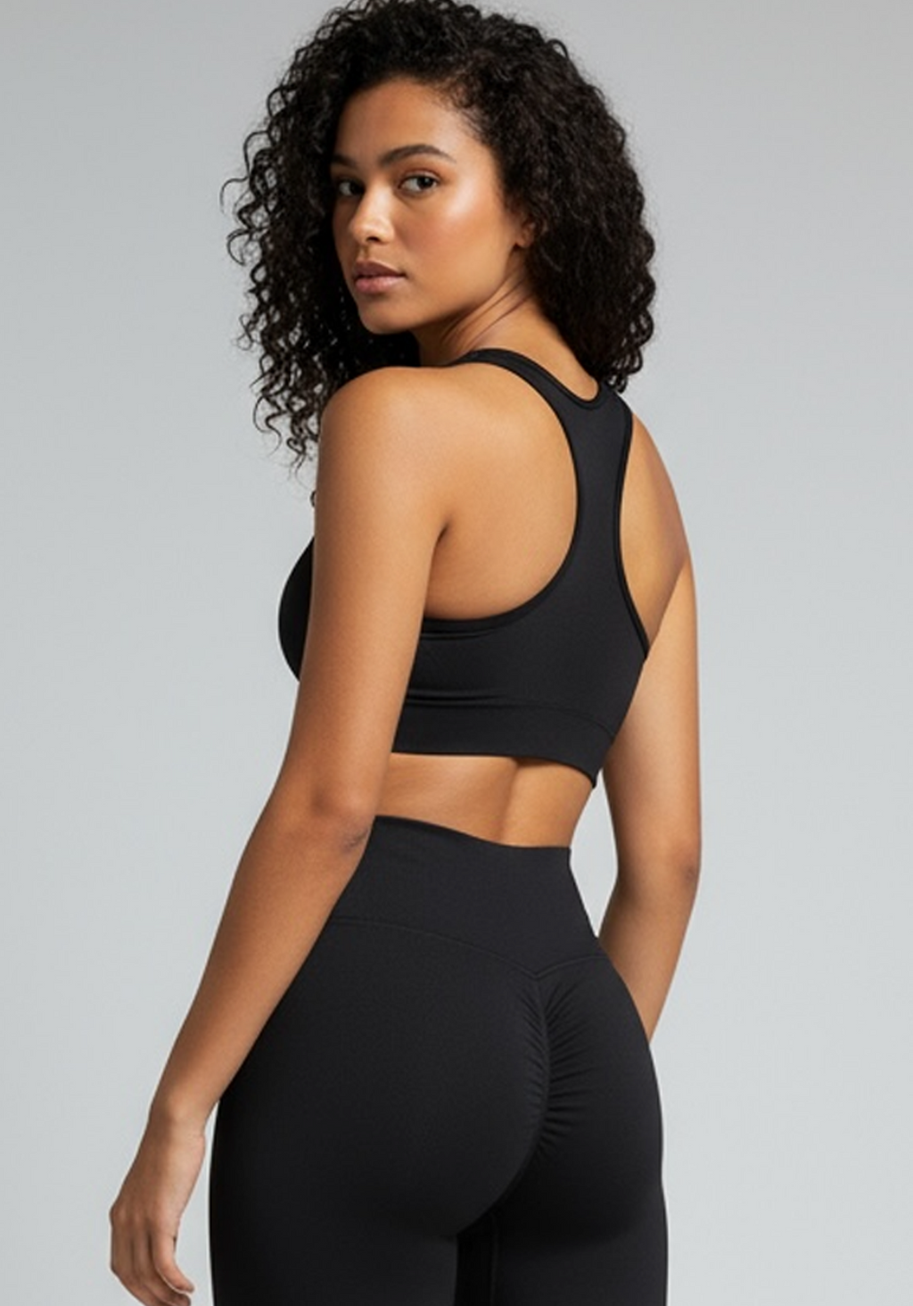 Layer Women’s Lift Training Leggings in black – on-model back view showing flattering fit and supportive waistband