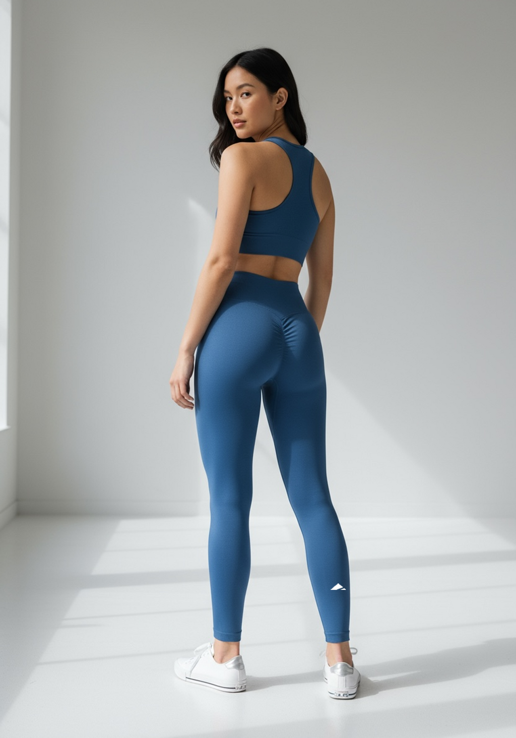 Layer Women’s Lift Training Leggings in navy – on-model back view showing contoured waistband and athletic shape