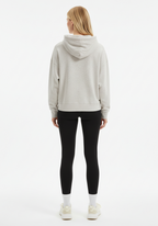 Woman wearing Layer Love Your Run hoodie in warm grey, rear view, relaxed fit athletic hoodie