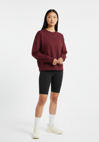 Womens Layer Love Your Run sweatshirt in burgundy, front view styled with black cycling shorts
