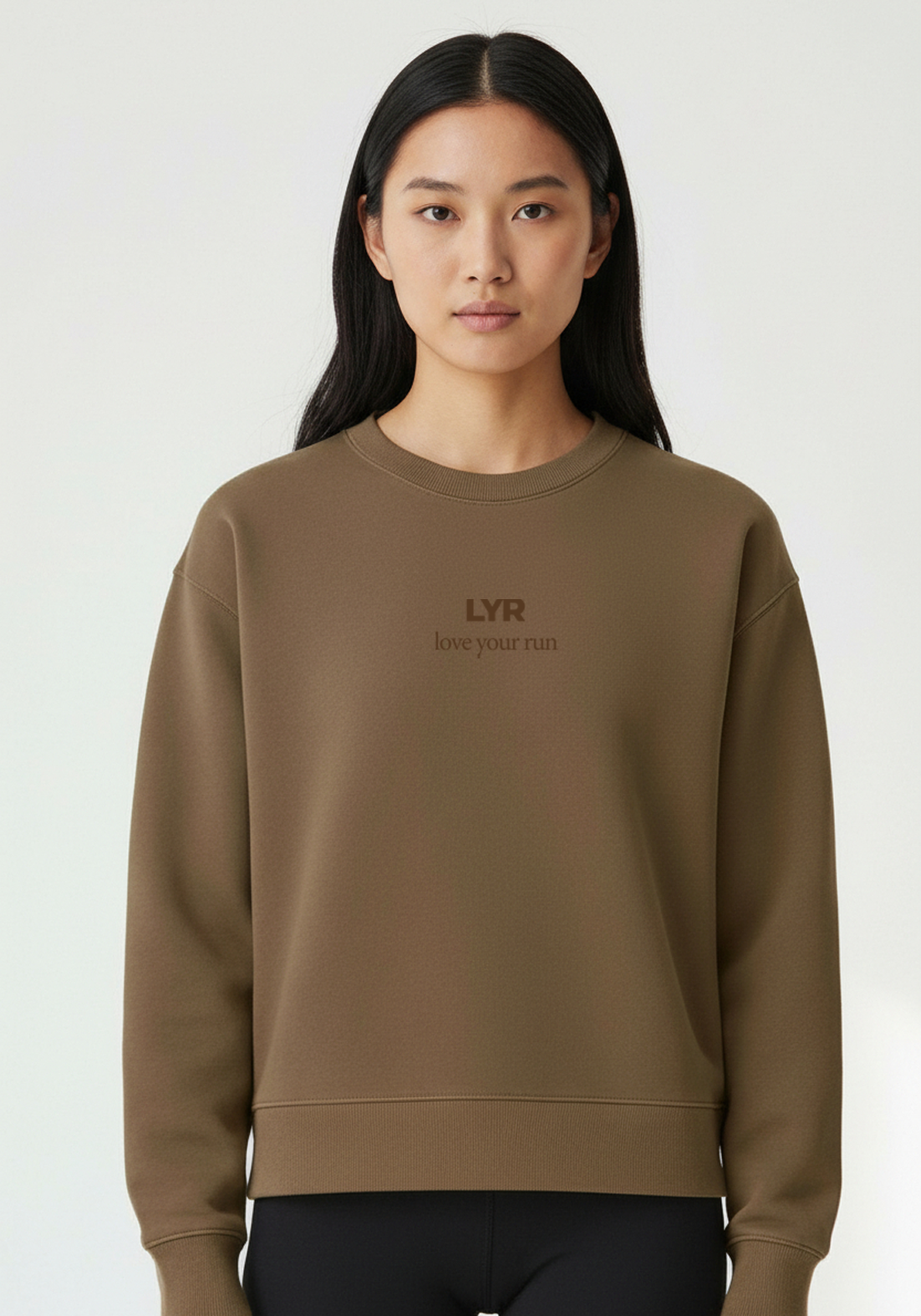 Close up of Womens Layer Love Your Run sweatshirt in mocha with subtle LYR chest print