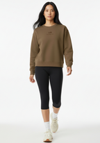 Womens Layer Love Your Run sweatshirt in mocha shown from the front while walking