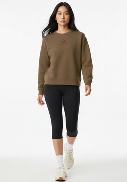 Layer Love Your Run Women's sweatshirt in mocha, front walking view on model
