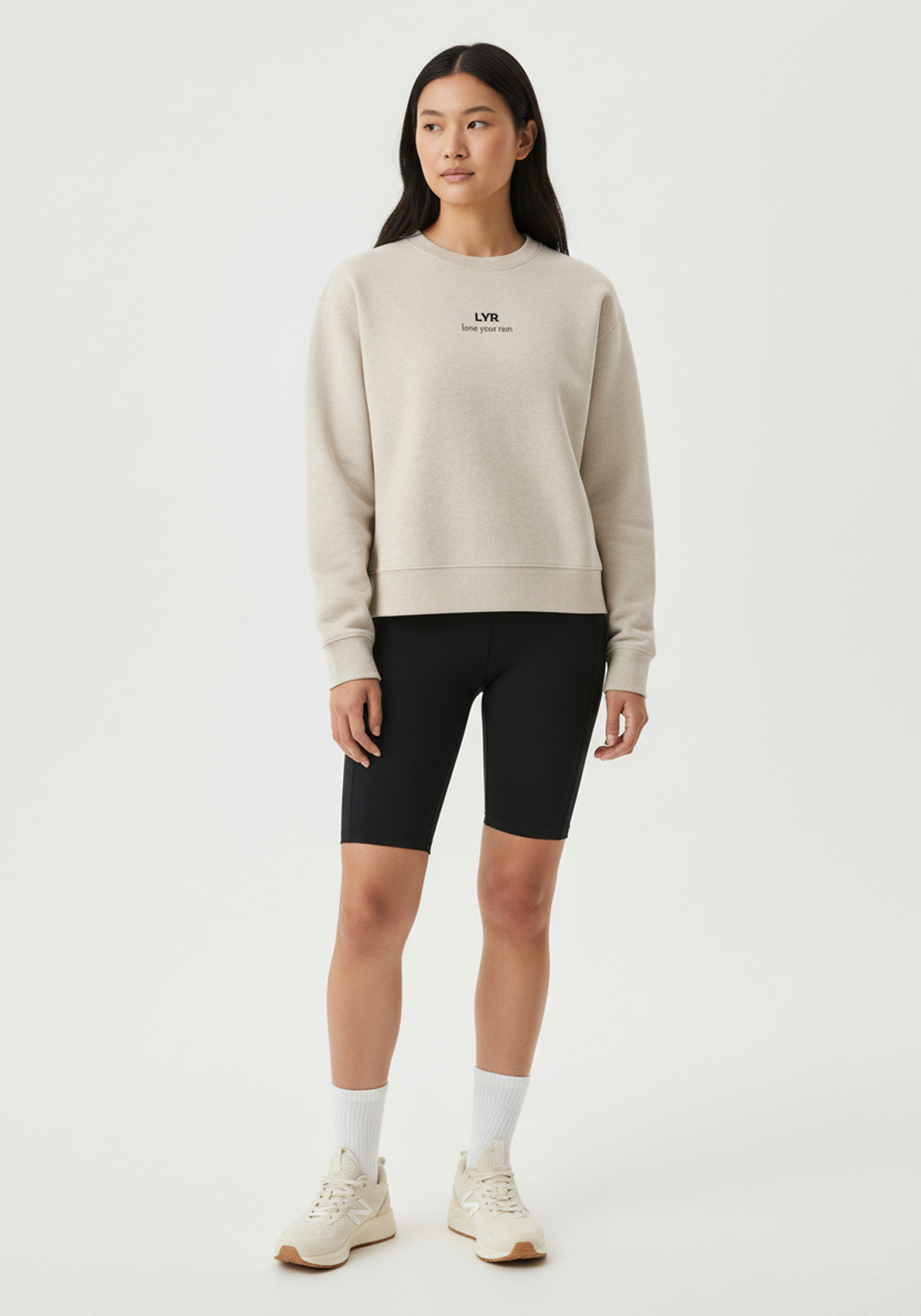 Layer Love Your Run Women's sweatshirt in warm grey, front view on model
