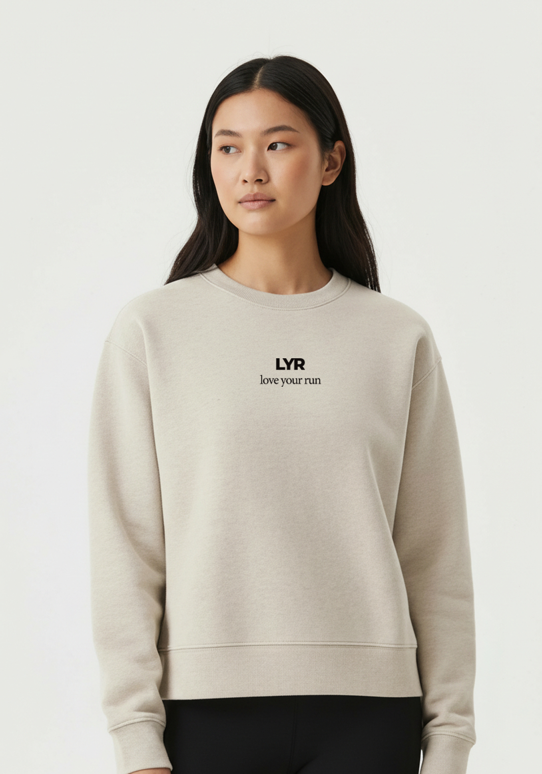 Layer Love Your Run Women's sweatshirt in warm grey, chest logo close-up
