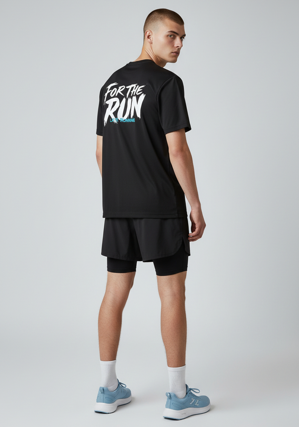 Side back view of men’s black Layer FTR graphic running tee highlighting rear graphic