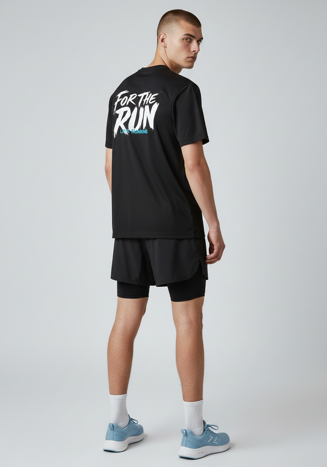 Side back view of men’s black Layer FTR graphic running tee highlighting rear graphic