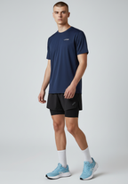 Angled front view of men’s navy Layer FTR graphic running tee showing fit and drape