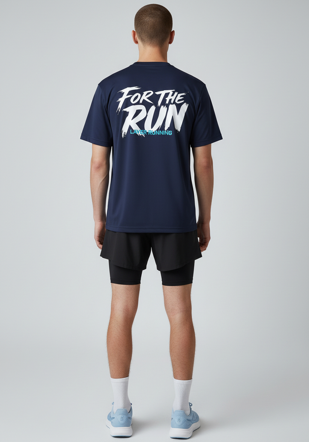 Rear full body view of men’s navy Layer FTR graphic running tee and shorts