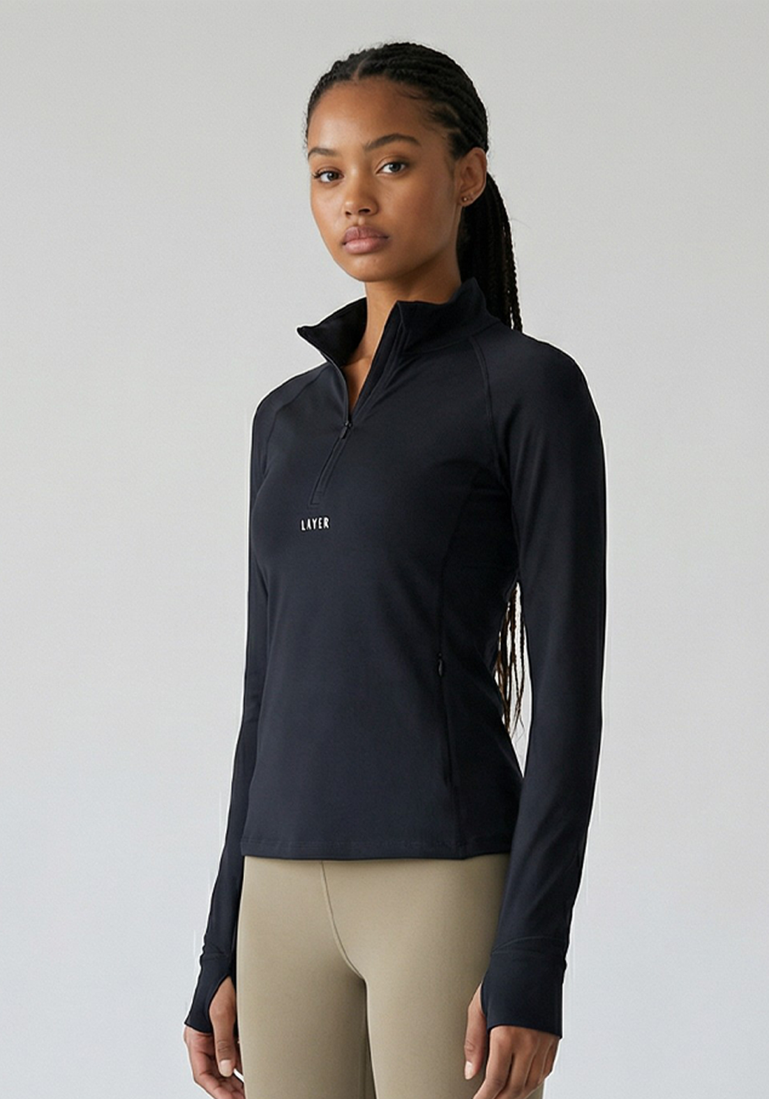Layer Training 1/4 Zip in black, side view
