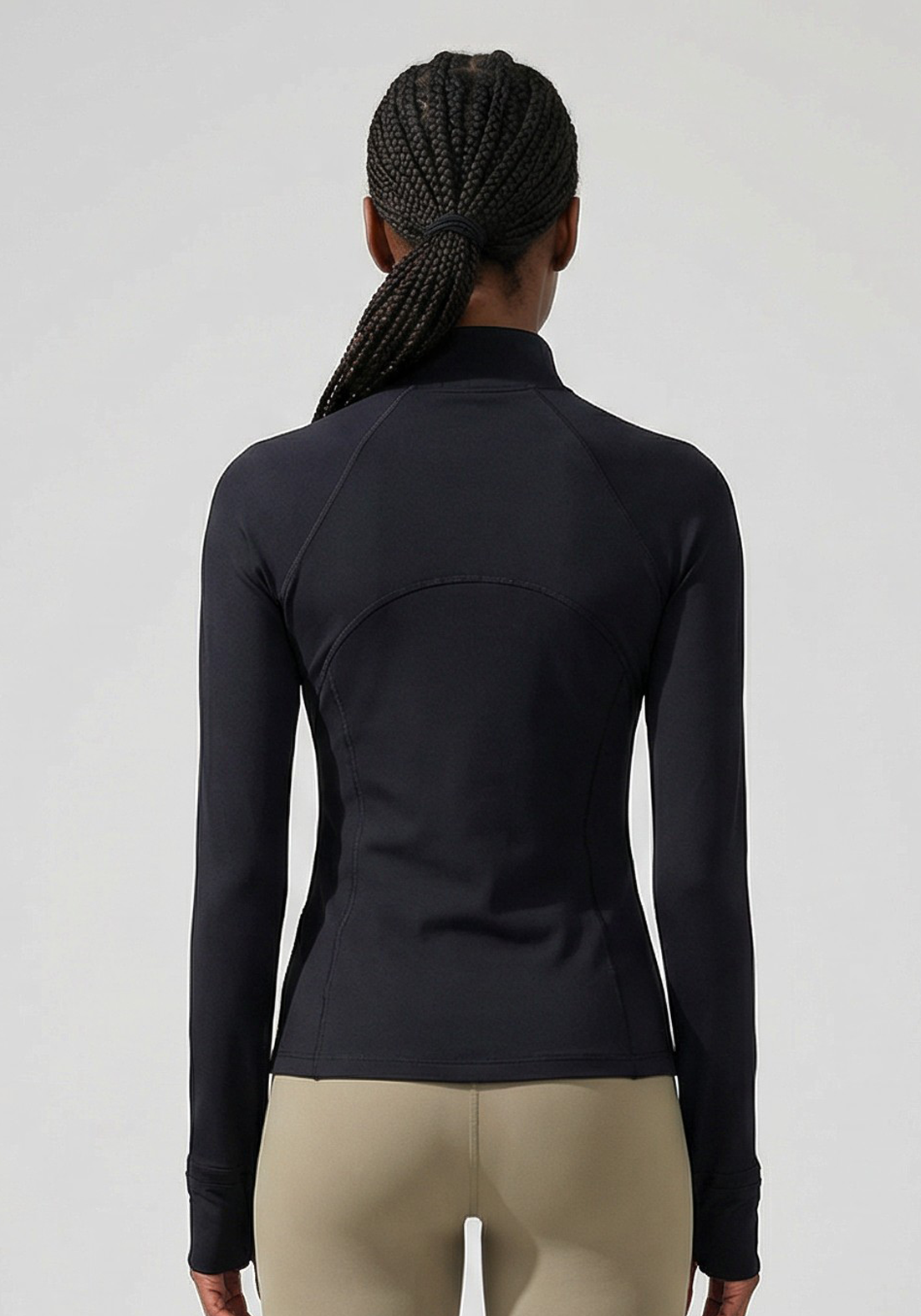 Layer Training 1/4 Zip in black, back view
