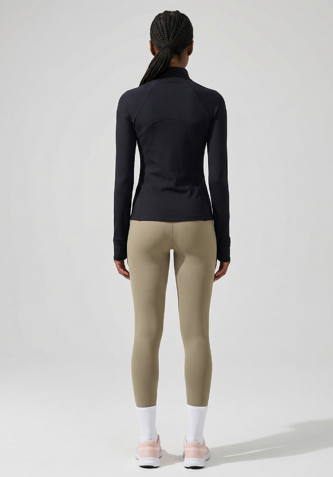 Layer Training 1/4 Zip in black, full back view
