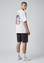 Layer Run The City Tee in Tokyo, side view with city graphic

