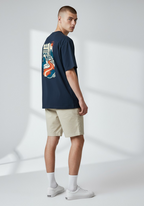 Layer Run The City Tee in Paris, side view with city graphic
