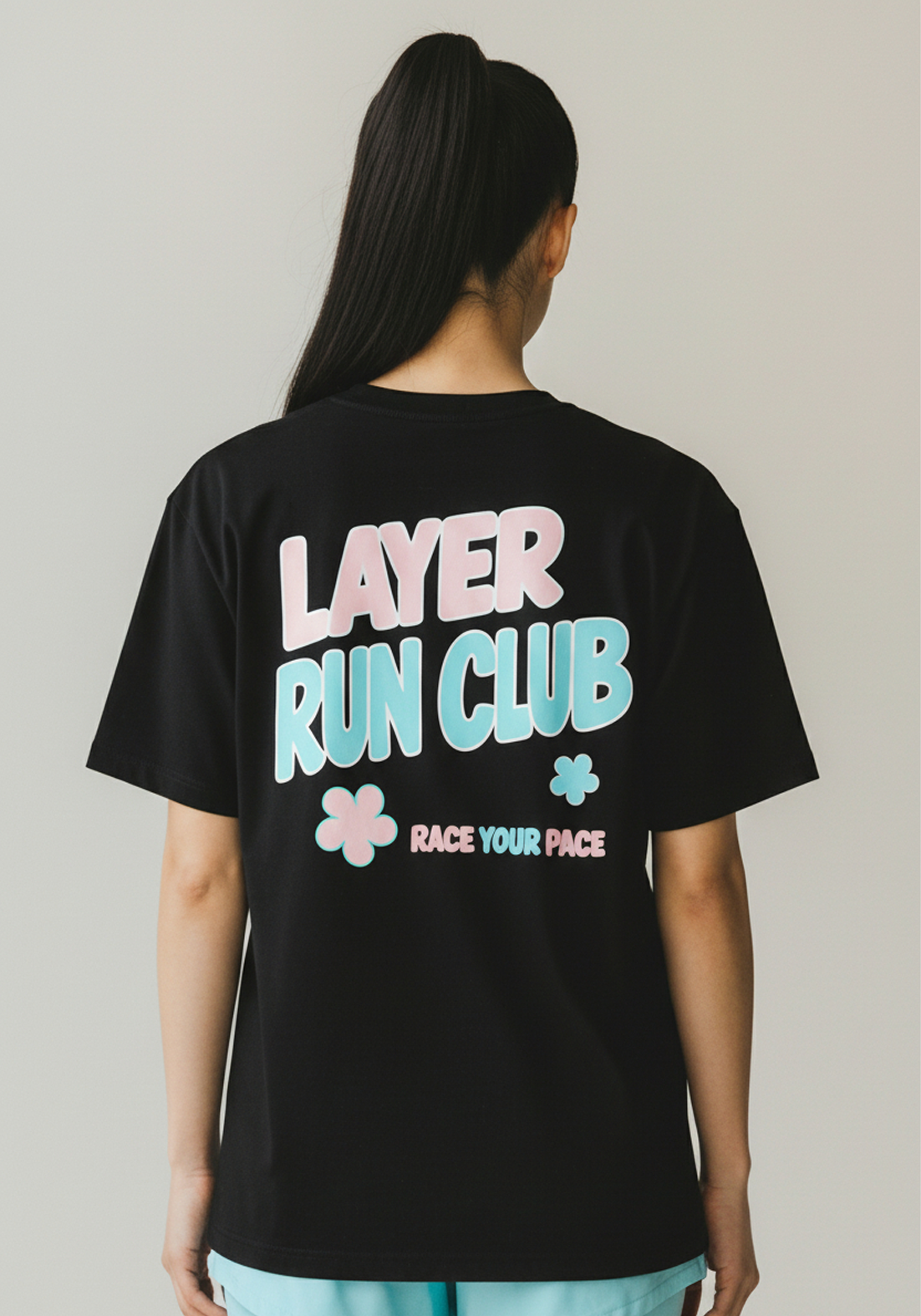 Layer Race Your Pace Run Club Tee in black, back graphic view
