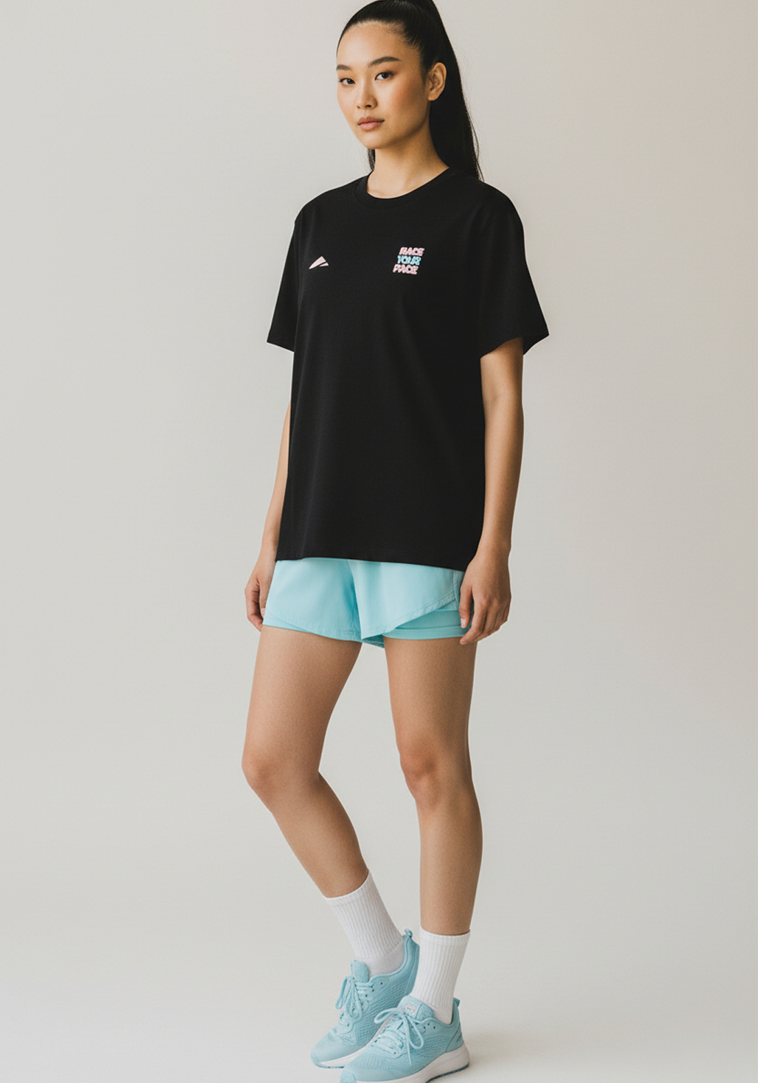 Layer Race Your Pace Run Club Tee in black, angled view
