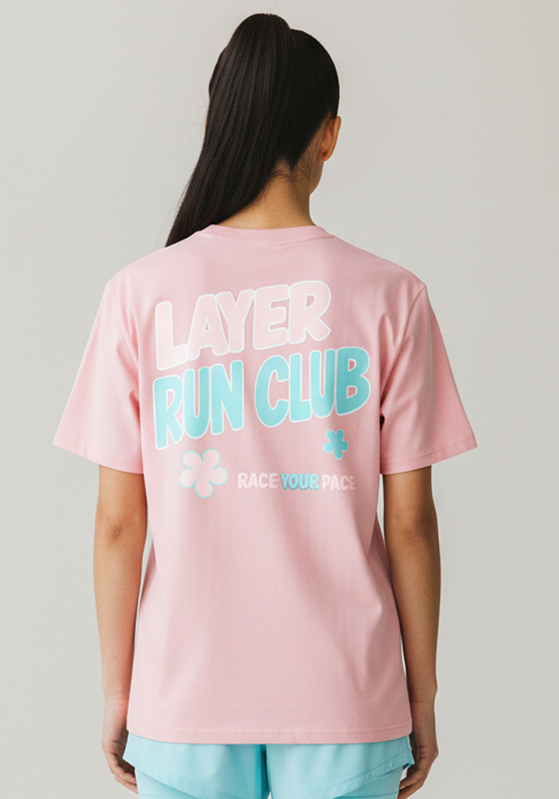 Layer Race Your Pace Run Club Tee in Soft Pink, back graphic view
