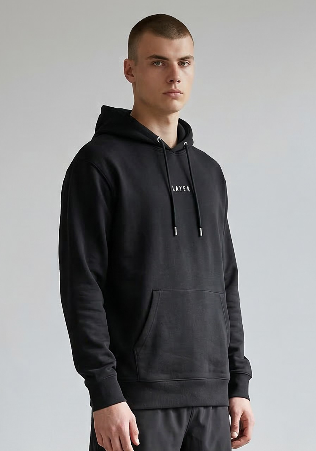 Layer Race Your Pace Symbol Hoodie in Black, angled view
