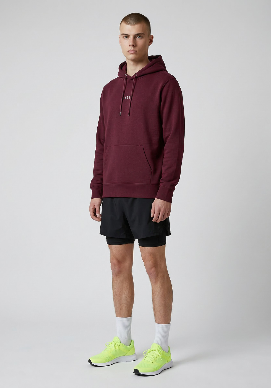 Layer Race Your Pace Symbol Hoodie in Plum, angled view
