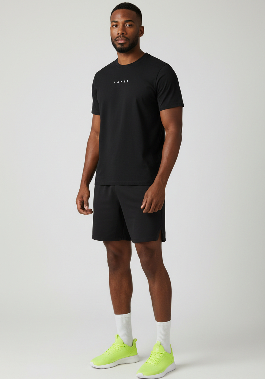 Layer Race Your Pace Symbol Tee in Black, angled view
