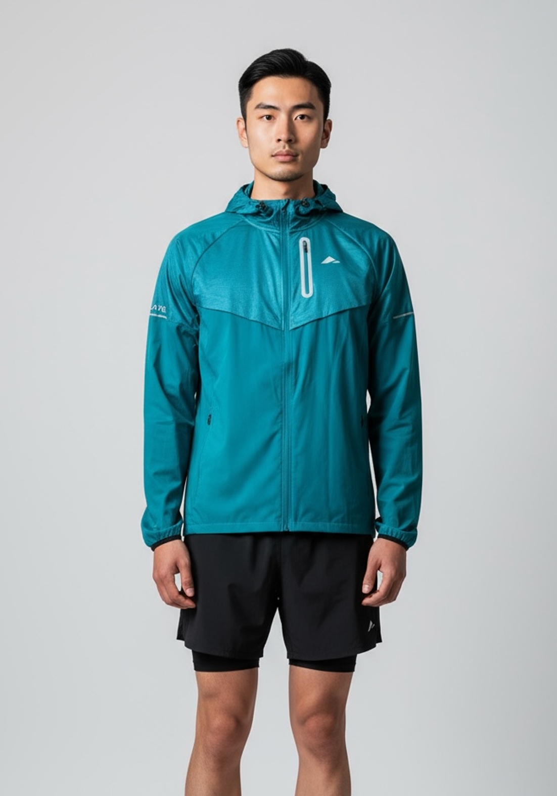 Layer Tempo Running Windbreaker in alpine green, front view with zip pocket
