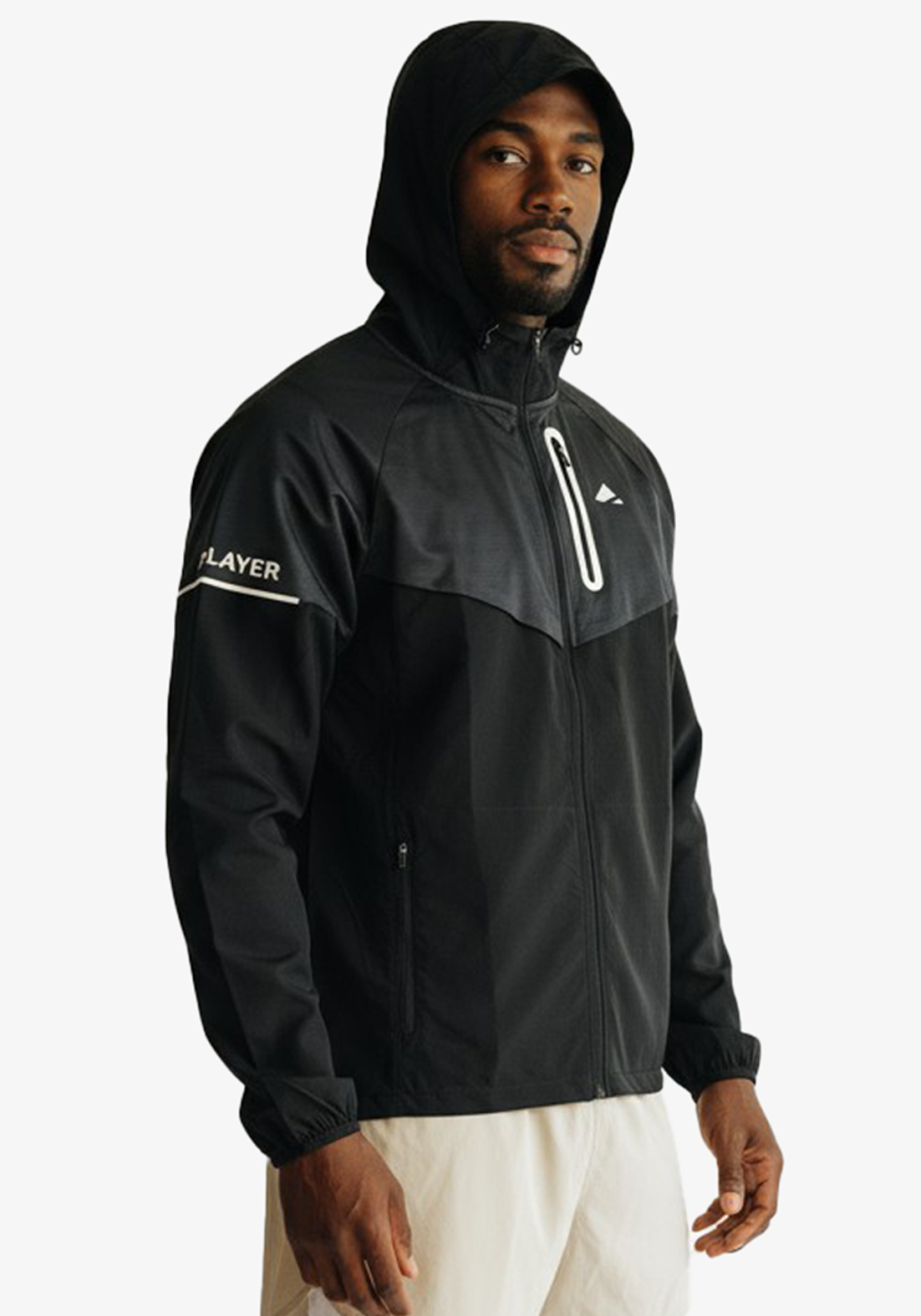 Layer Tempo Running Windbreaker in black worn by runner training
