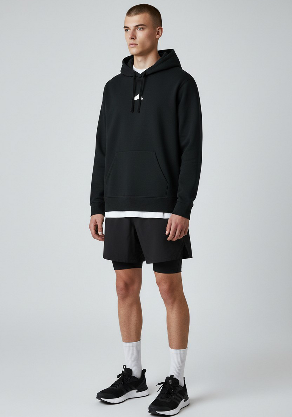 Layer Tempo Training Hoodie black front angled view showing hood and chest logo