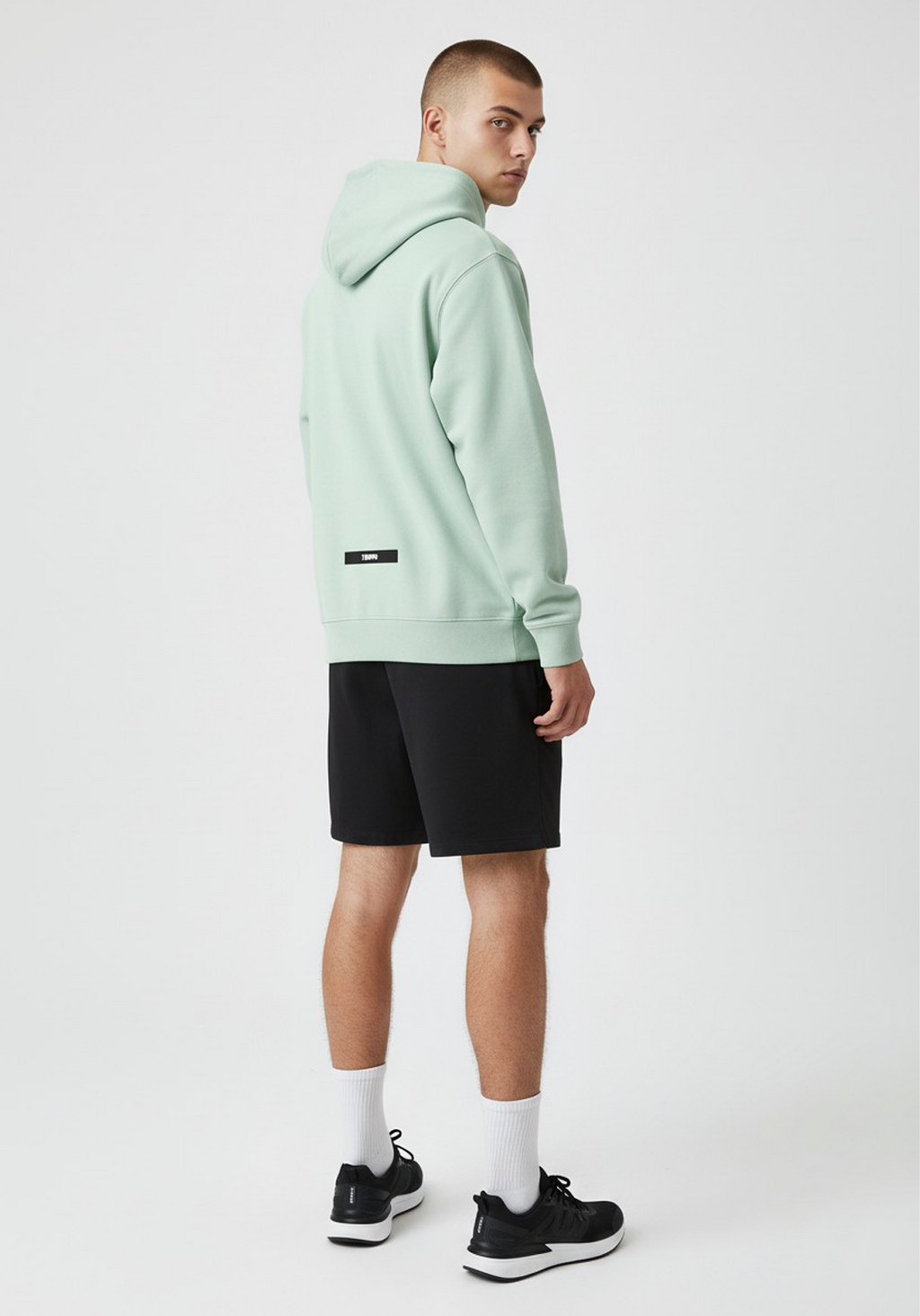 Layer Tempo Training Hoodie seafoam green rear three quarter view showing clean back design