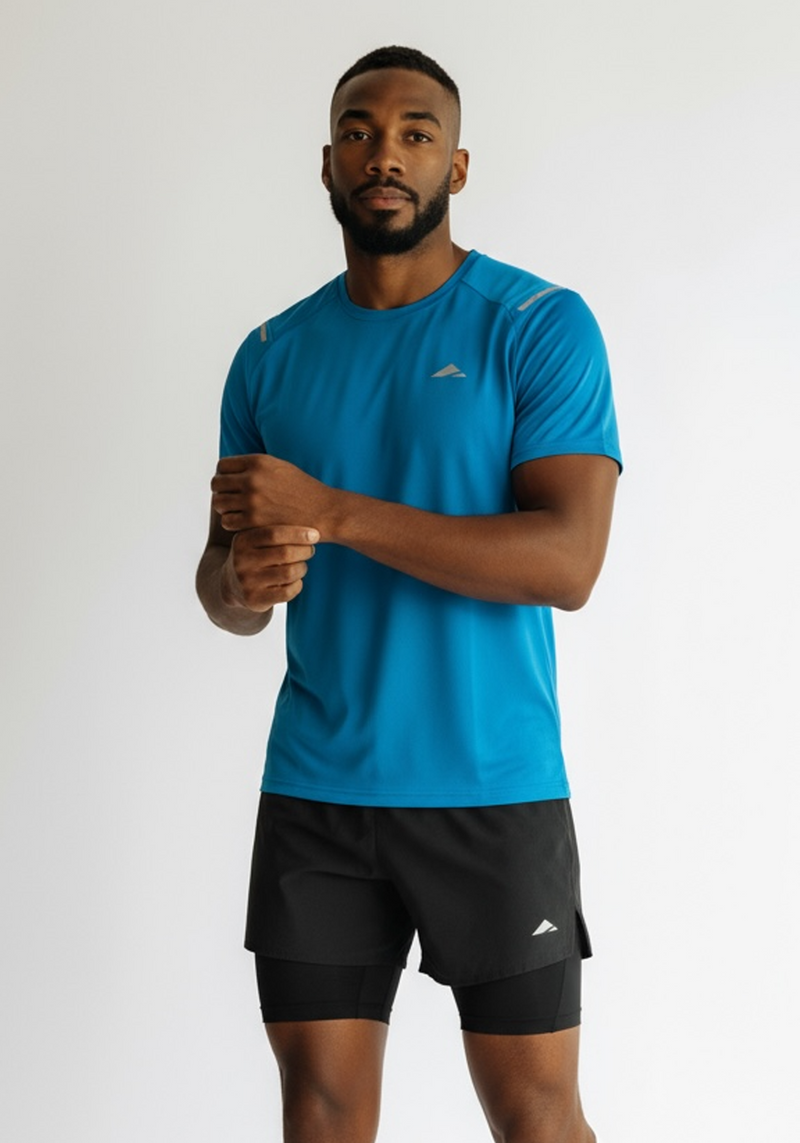 Layer Men’s Tempo Running Tee in aqua – close-up detail highlighting stretch texture and reflective Layer branding