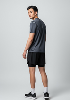 Layer Men’s Tempo Running Tee in graphite – on-model back view showing breathable mesh fabric and athletic fit