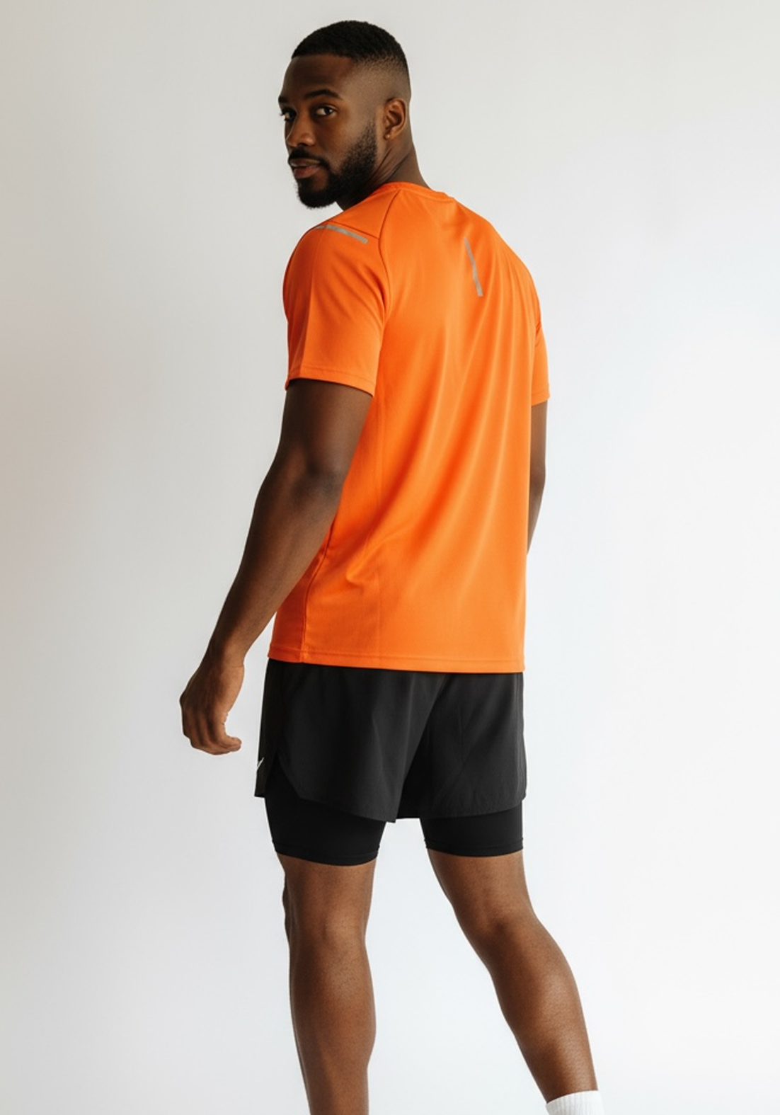 Layer Tempo Running Tee in orange blaze, back view

