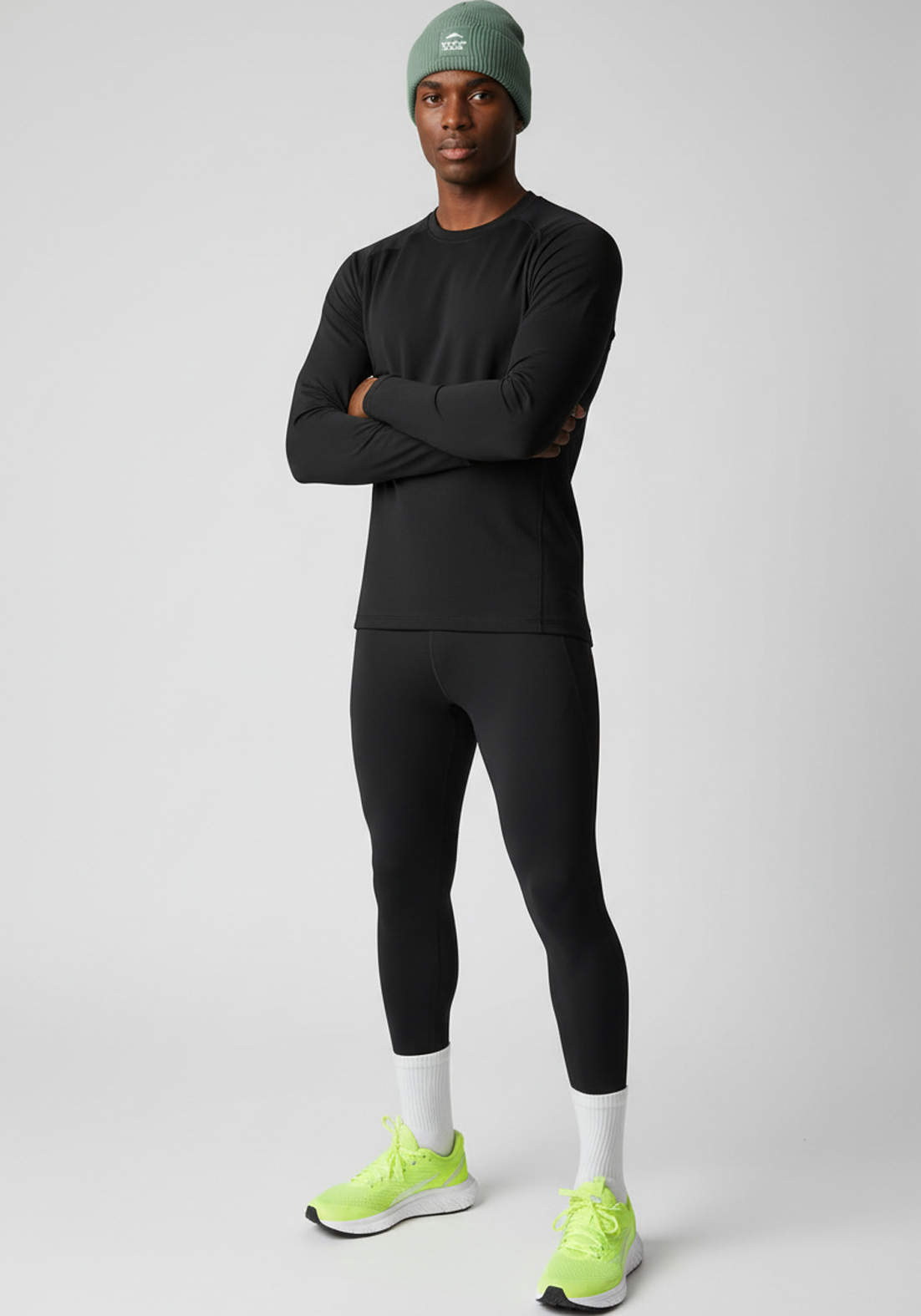 Front view of alpine green Layer Track Club beanie with tonal Track Club patch