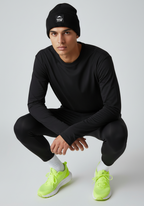 Close up of black Layer Track Club beanie with Track Club patch detail