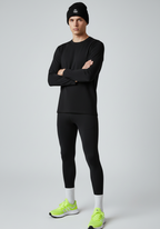 Front view of black Layer Track Club beanie worn with Layer performance base layer