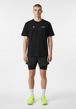 Layer Track Club Tee in black, full view on-model 
