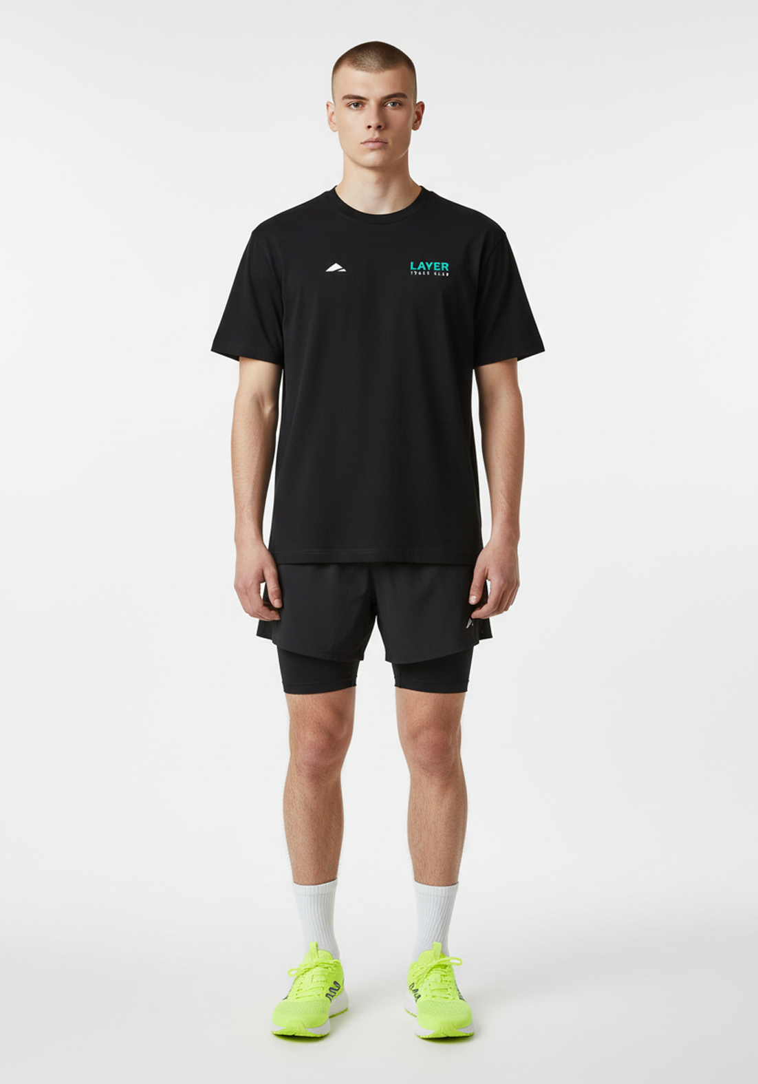 Model wearing the Layer Track Club Tee in black with Layer Track Club logo and relaxed everyday fit.