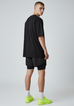 Layer Track Club Tee in black, side view 
