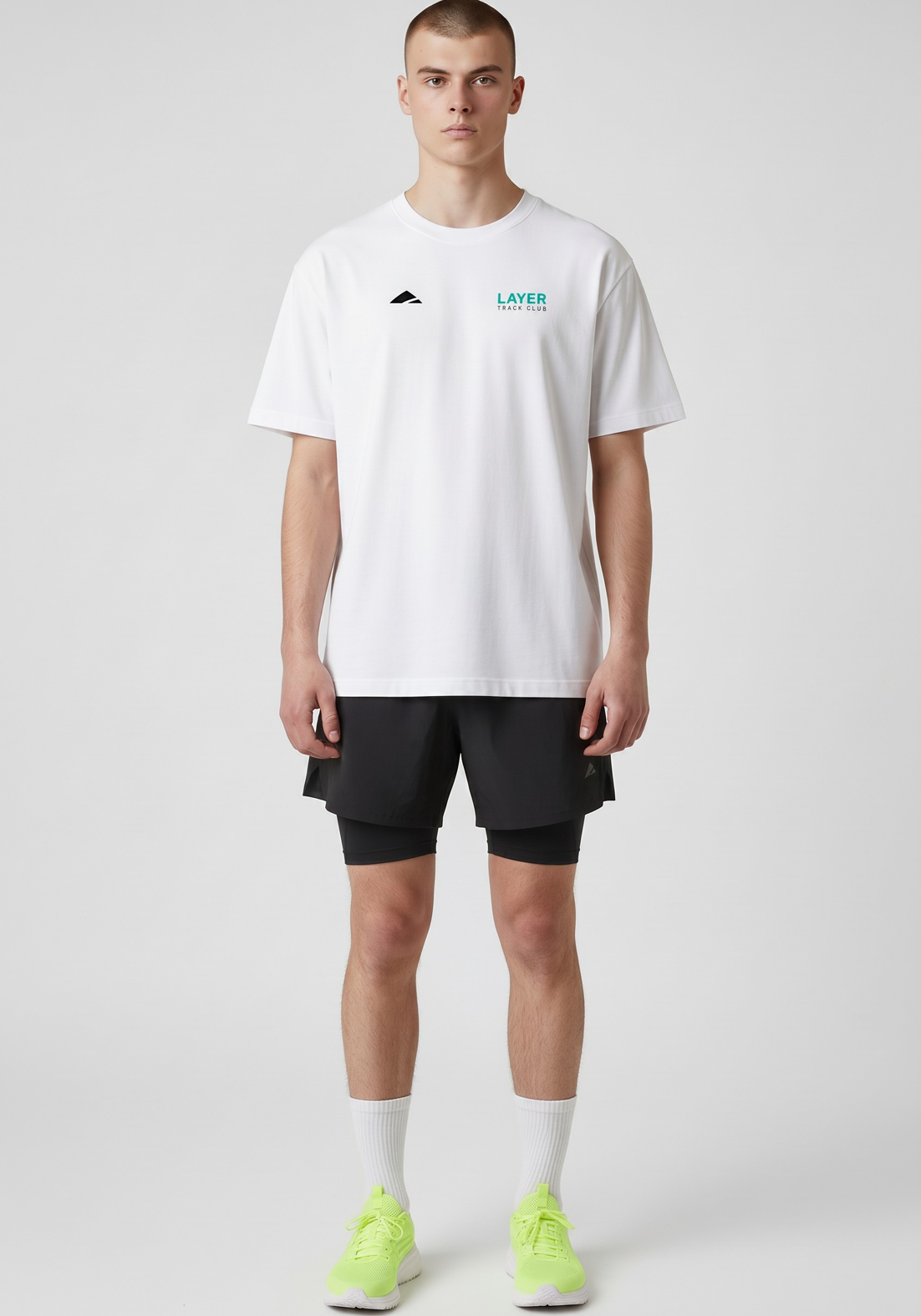 Layer Track Club Tee in white, front view on-model
