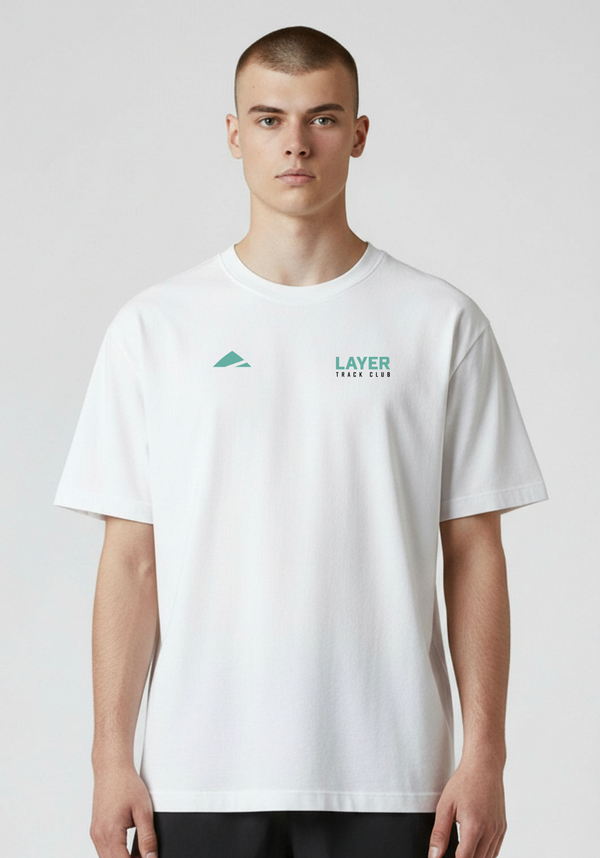 Close up of white Layer Track Club tee showing Layer logo detail