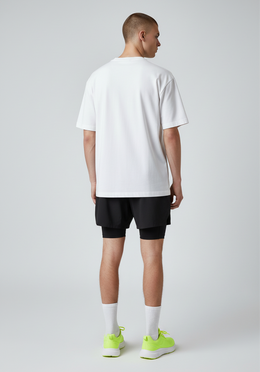 Layer Track Club Tee in white, back view on-model
