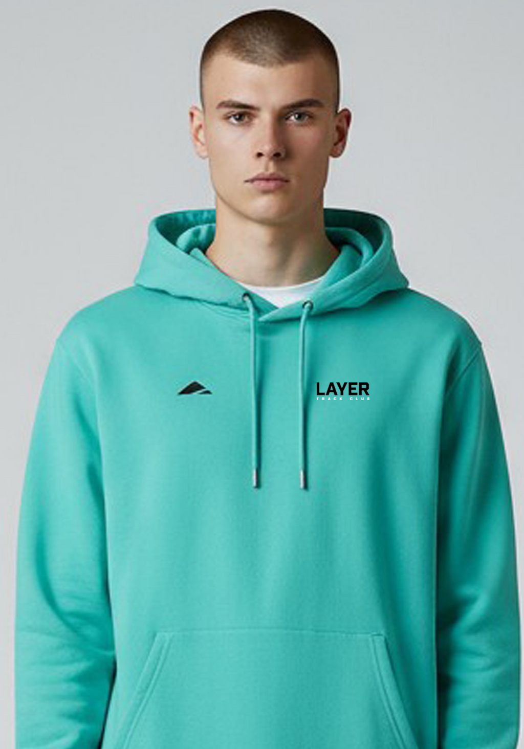 Layer Men’s Track Club Hoodie in teal – close-up front view showing minimalist logo and smooth cotton fabric