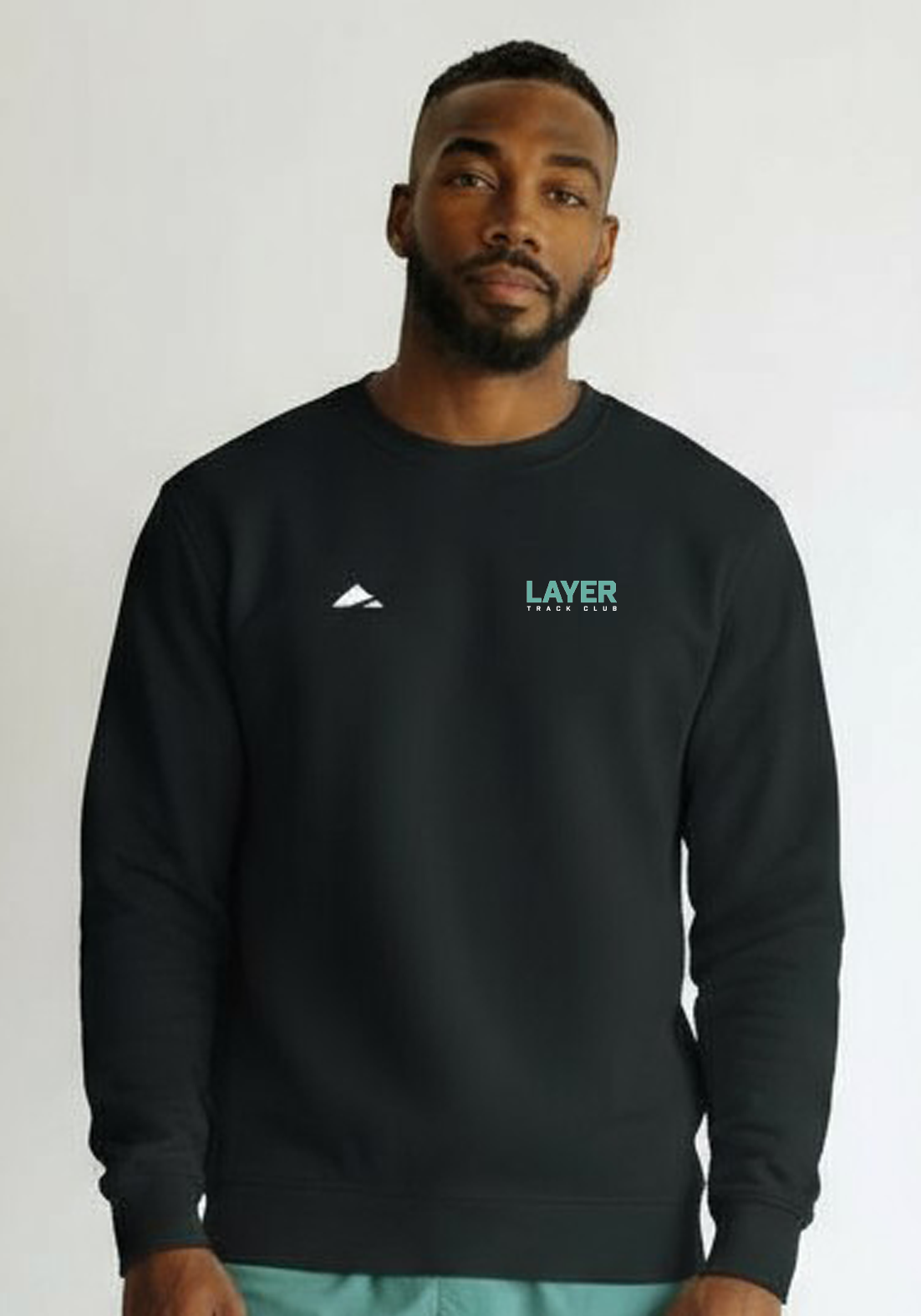 Layer Men’s Track Club Sweatshirt in black – front close-up showing soft brushed texture and Layer logo