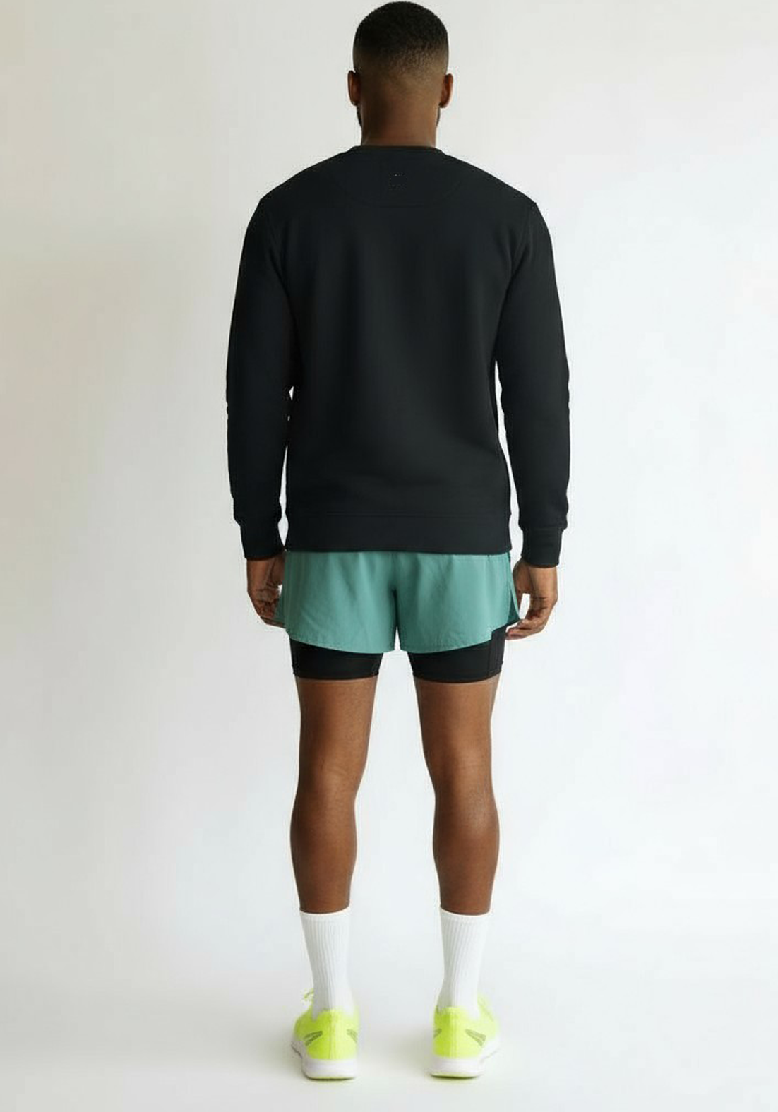 Layer Track Club sweatshirt in black, back view on model
