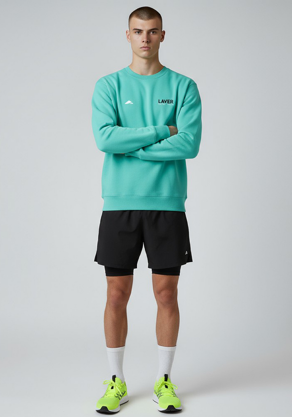 Layer Men’s Track Club Sweatshirt in teal – front view showing modern athletic silhouette and subtle branding